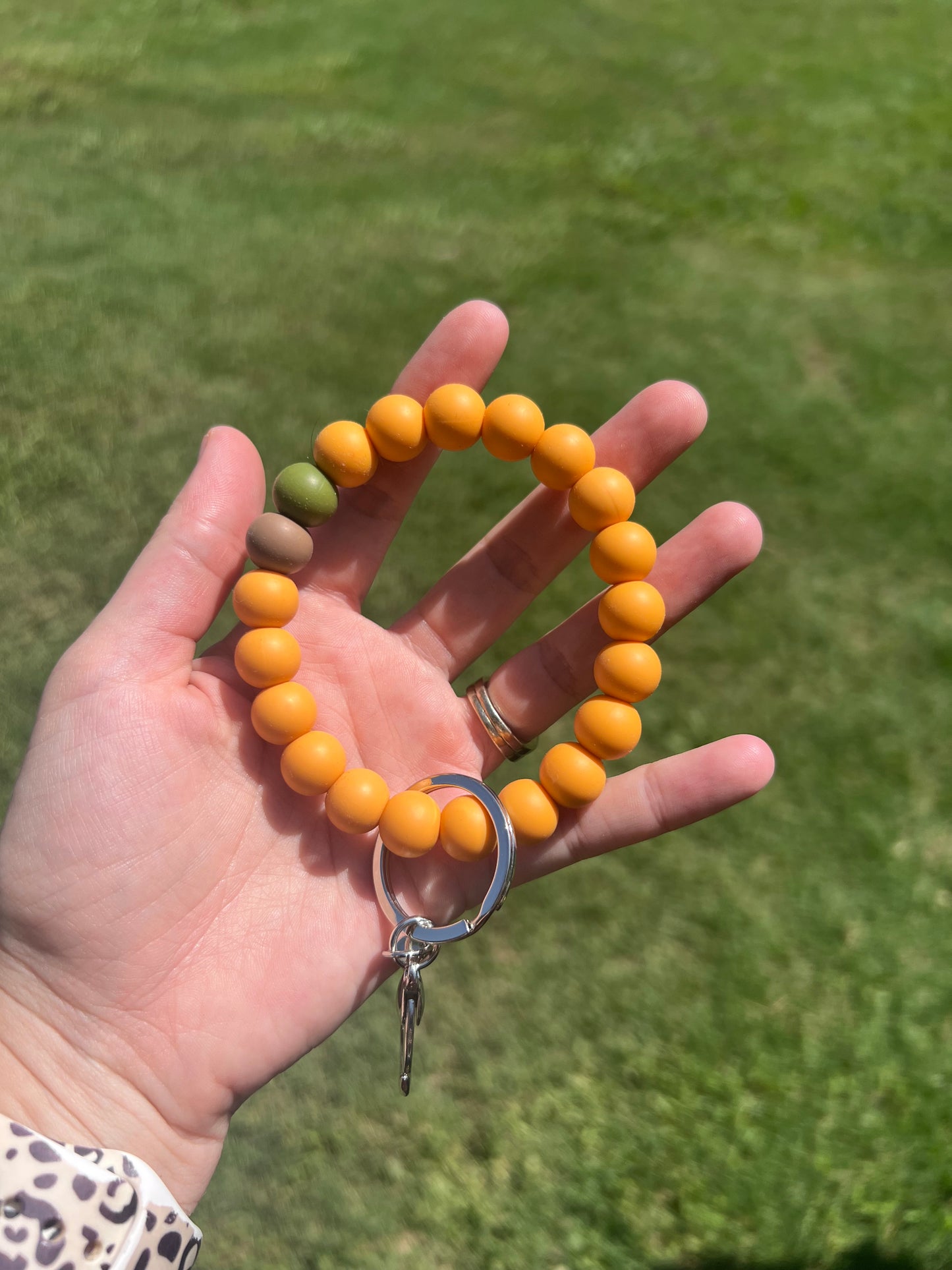 Orange, Green, and Tan Keychains