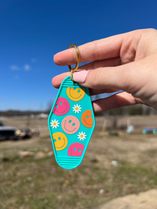 Smiles and Flowers Motel Keychain